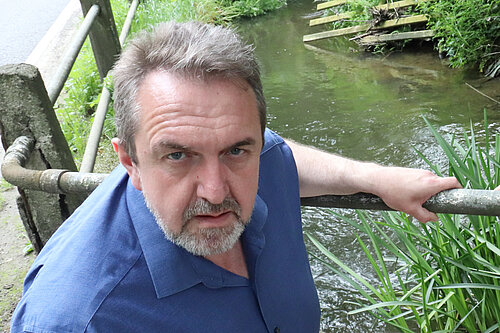Matthew Green overlooking a local river