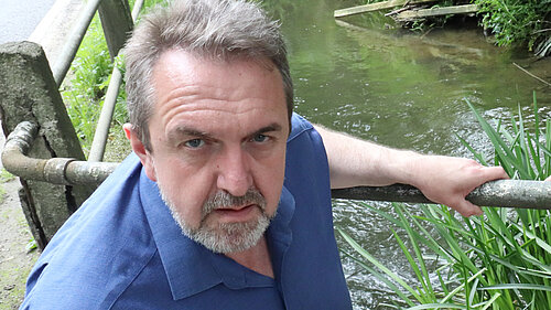 Matthew Green overlooking a local river
